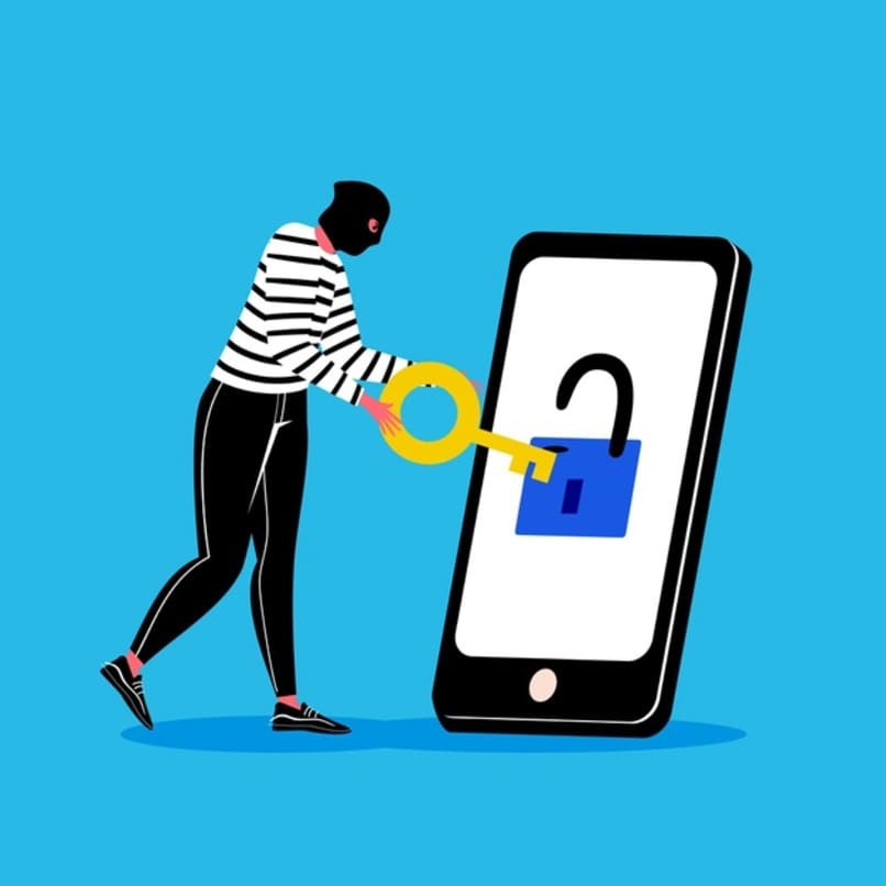 ladron tratando de desbloquear un móvil con una llave