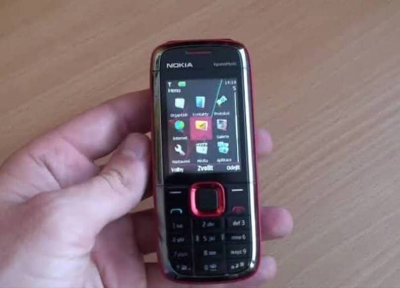 dispositivo diminuto botones flechas