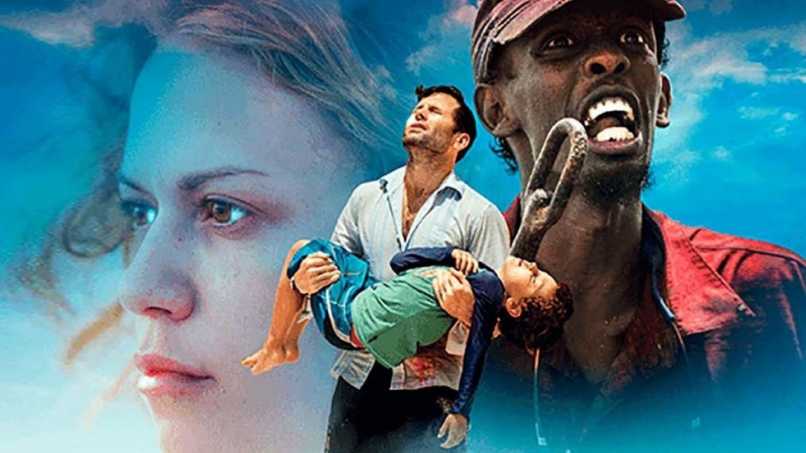 hombre cargando hijo