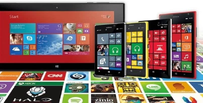 diferentes dispositivos moviles con windows fondo blanco